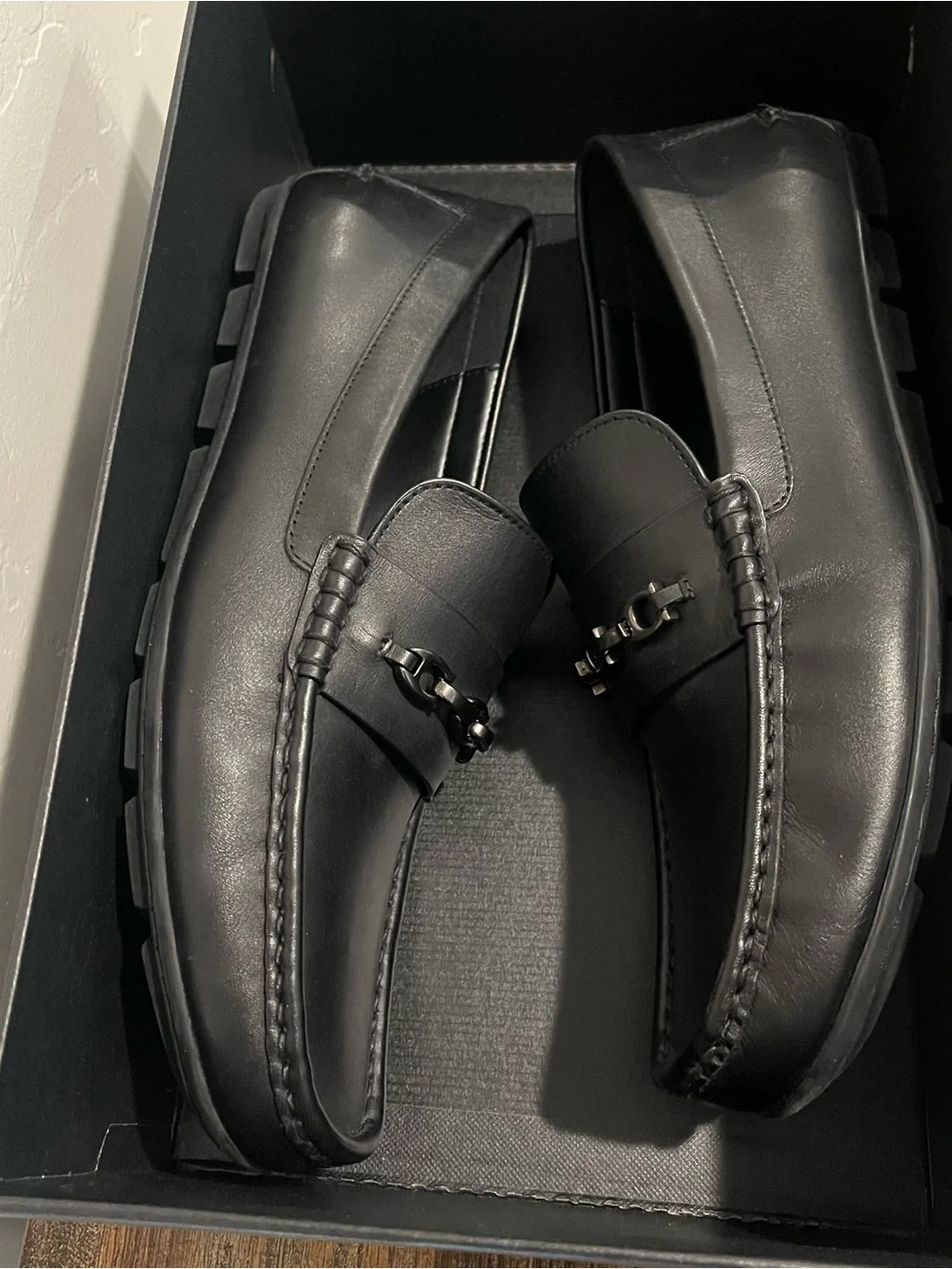 Coach polished black